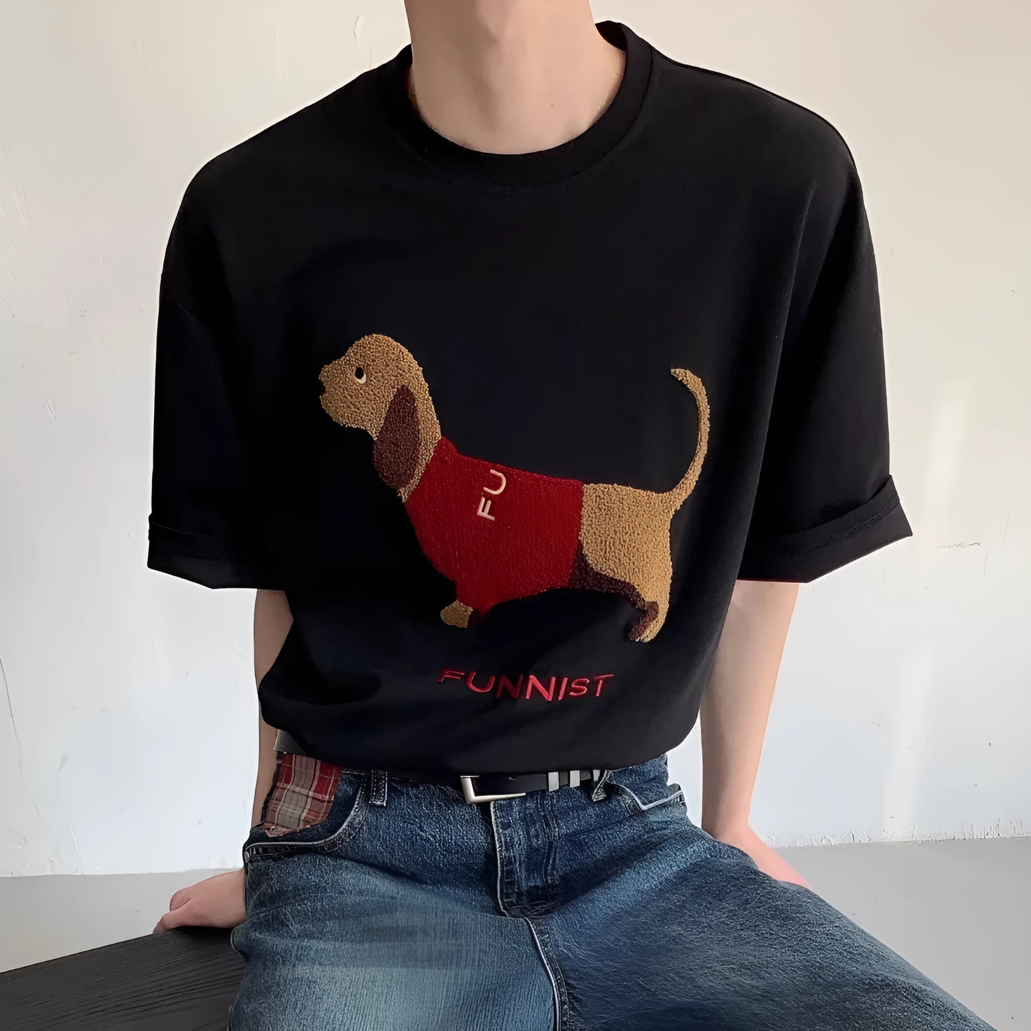 Grey men's round neck T-shirt with an embroidered dachshund dog design on the chest.