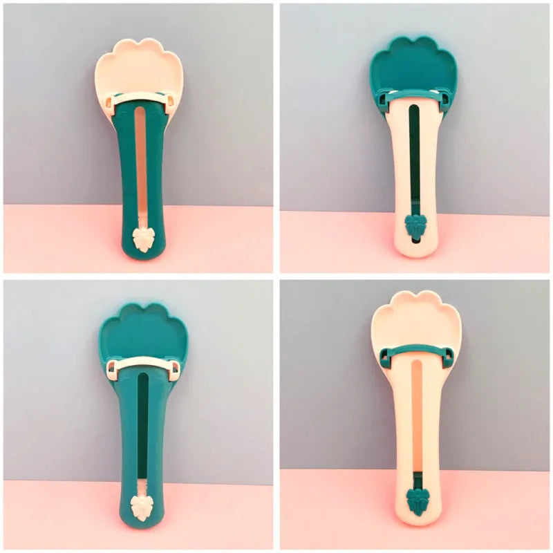 Pet food scoop dispenser with long silicone tubing and a set of five coloured nozzle heads on a green background.
