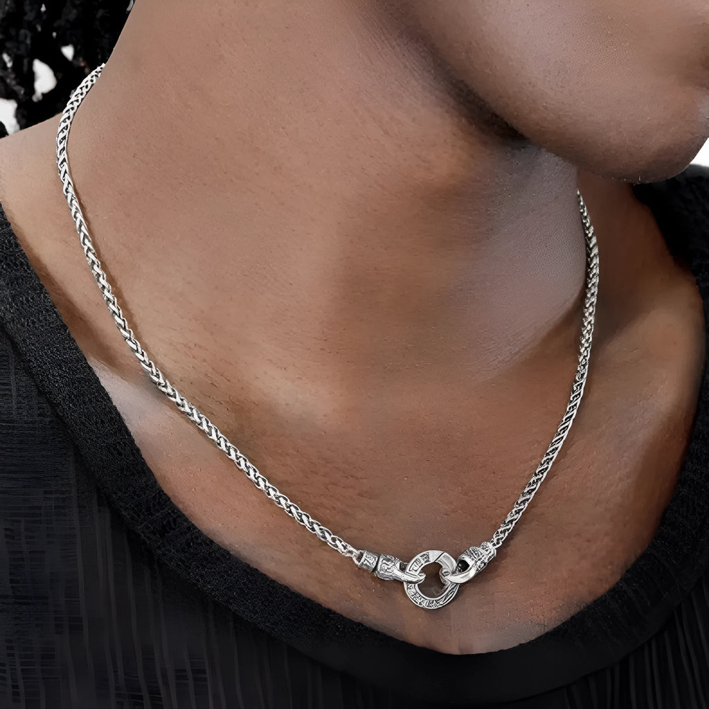 Delicate S925 sterling silver clavicle necklace with a small pendant on a fine chain.
