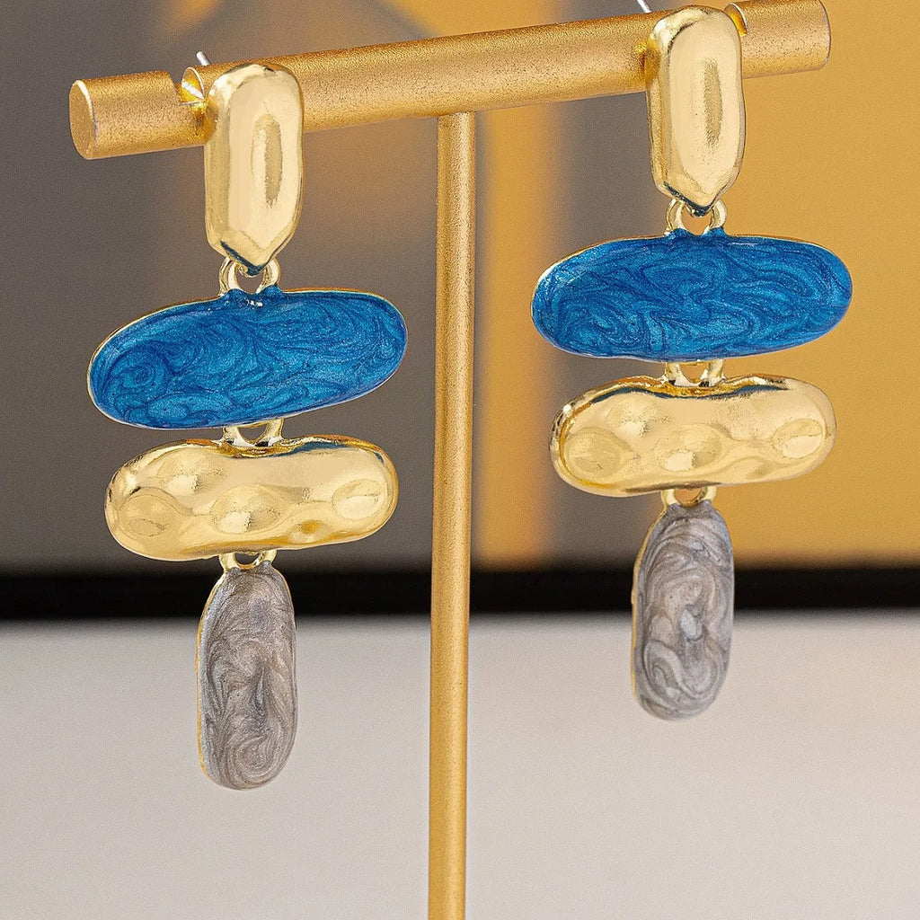 Geometric stud earrings with multicolour electroplated finish on zinc alloy