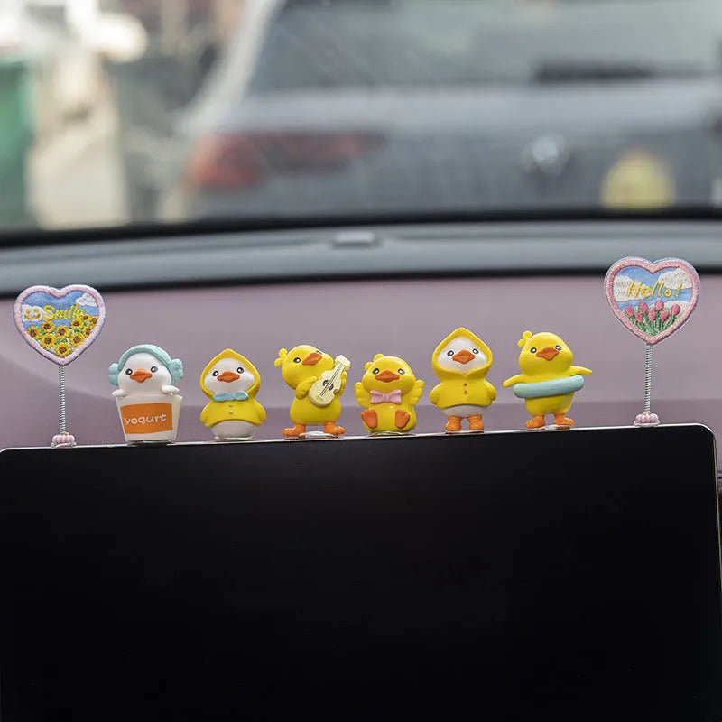 PVC duckling car decoration set with six cartoon duck ornaments and one greeting sign