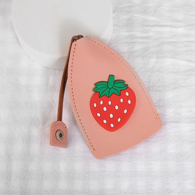 Colourful cartoon pull-out key case made from PU leather showing design options