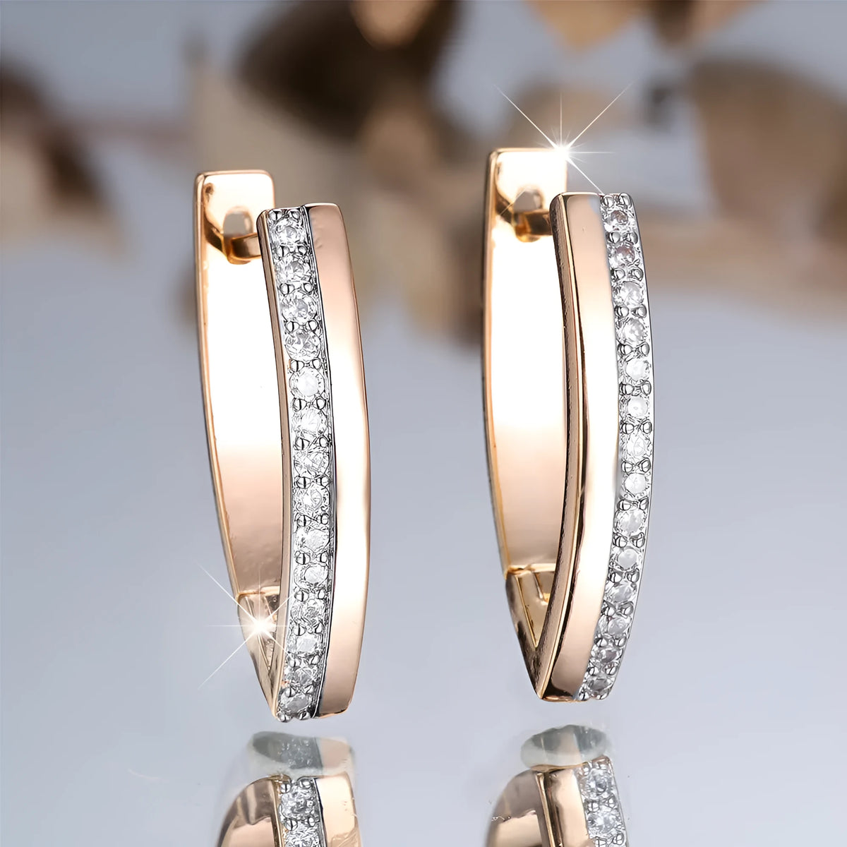 Women's geometric V-shaped champagne gold ear clips with clip-on design