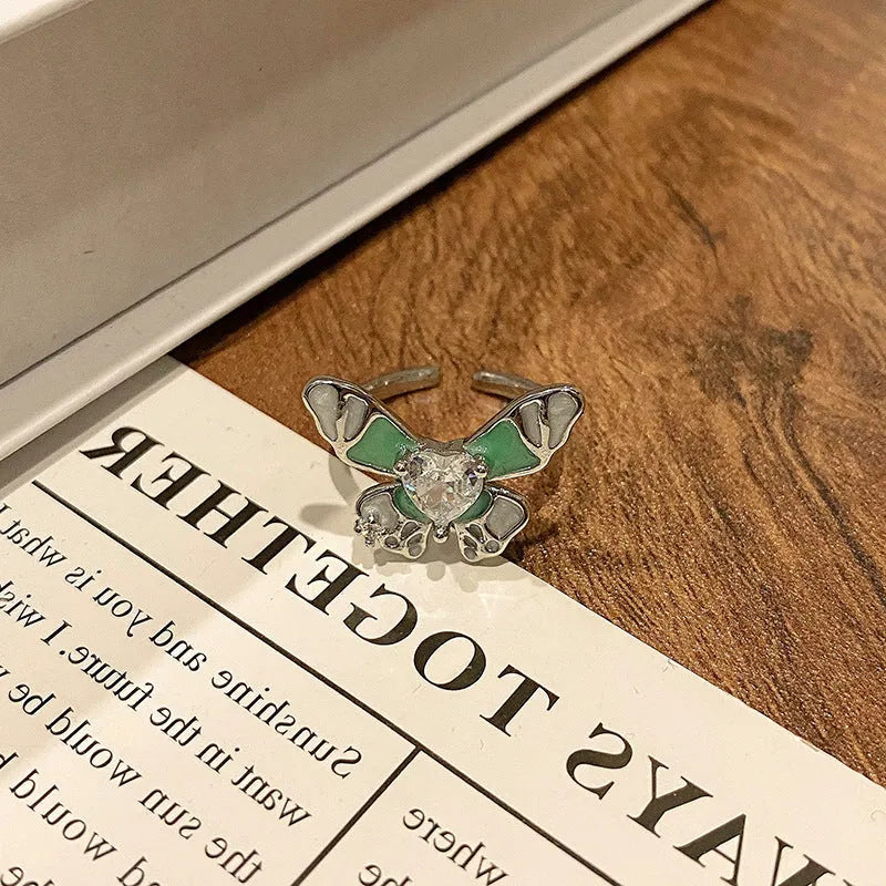 Butterfly women's copper ring with adjustable split ring design showing oil-drip colour treatment