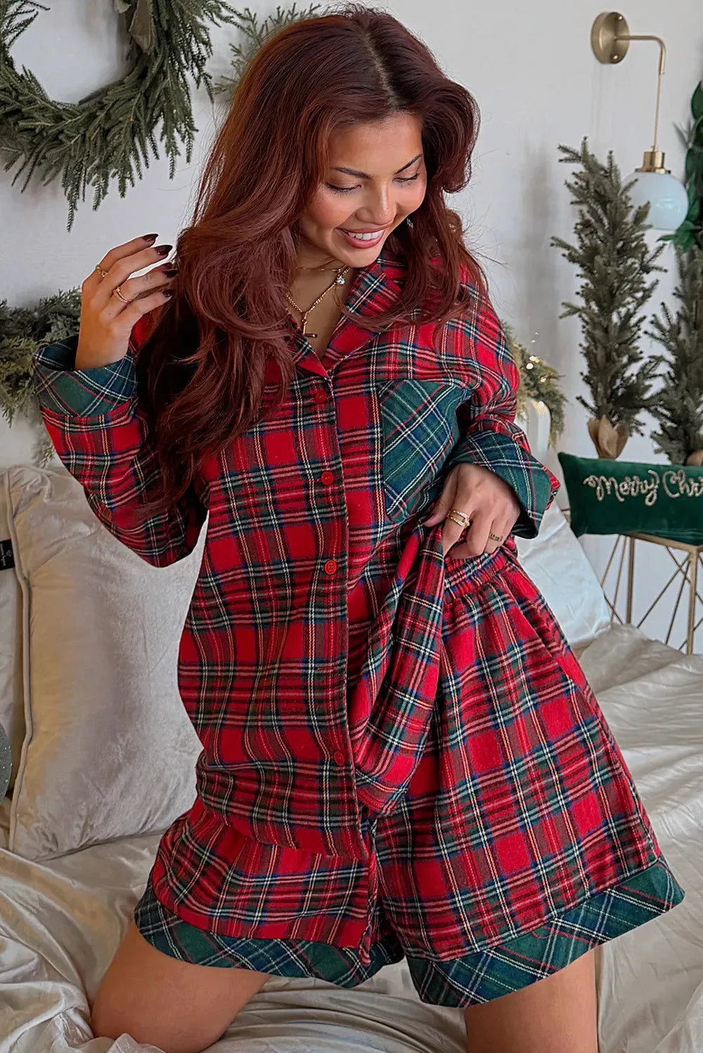 Red plaid Christmas pyjama set with contrast patches showing long sleeve shirt and matching shorts