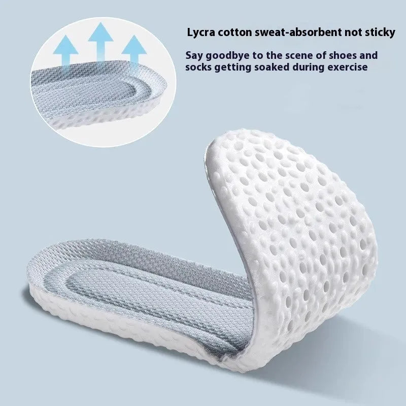 A pair of breathable grey PU foam sports insoles on a white background, shown with scissors to indicate their cut-to-fit feature.