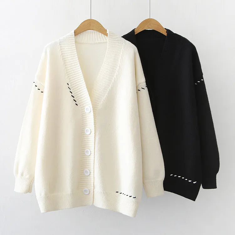 Women's loose fit knitted cardigan coat in black polyester fabric with long sleeves
