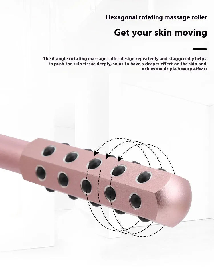 Purple handheld facial massage roller with textured surface on a white background.