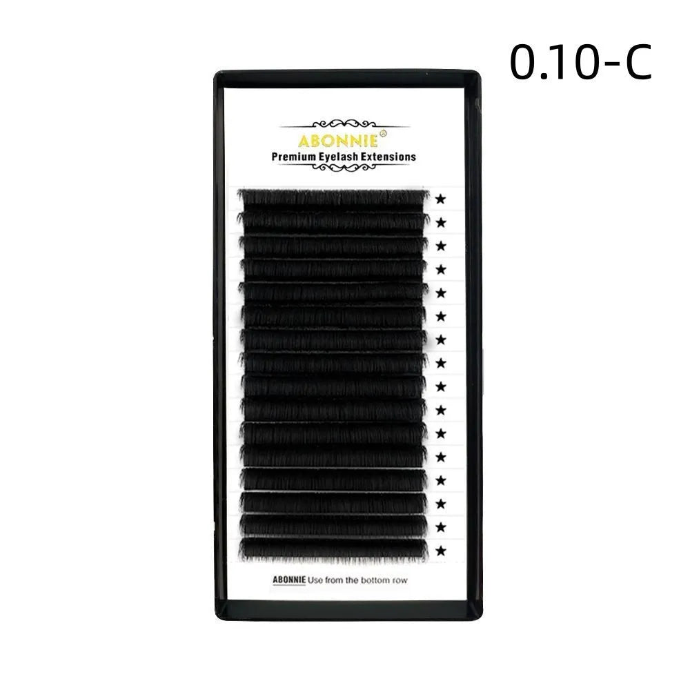 Pack of false eyelashes showing dense 16-row mink hair lashes on a clear band.