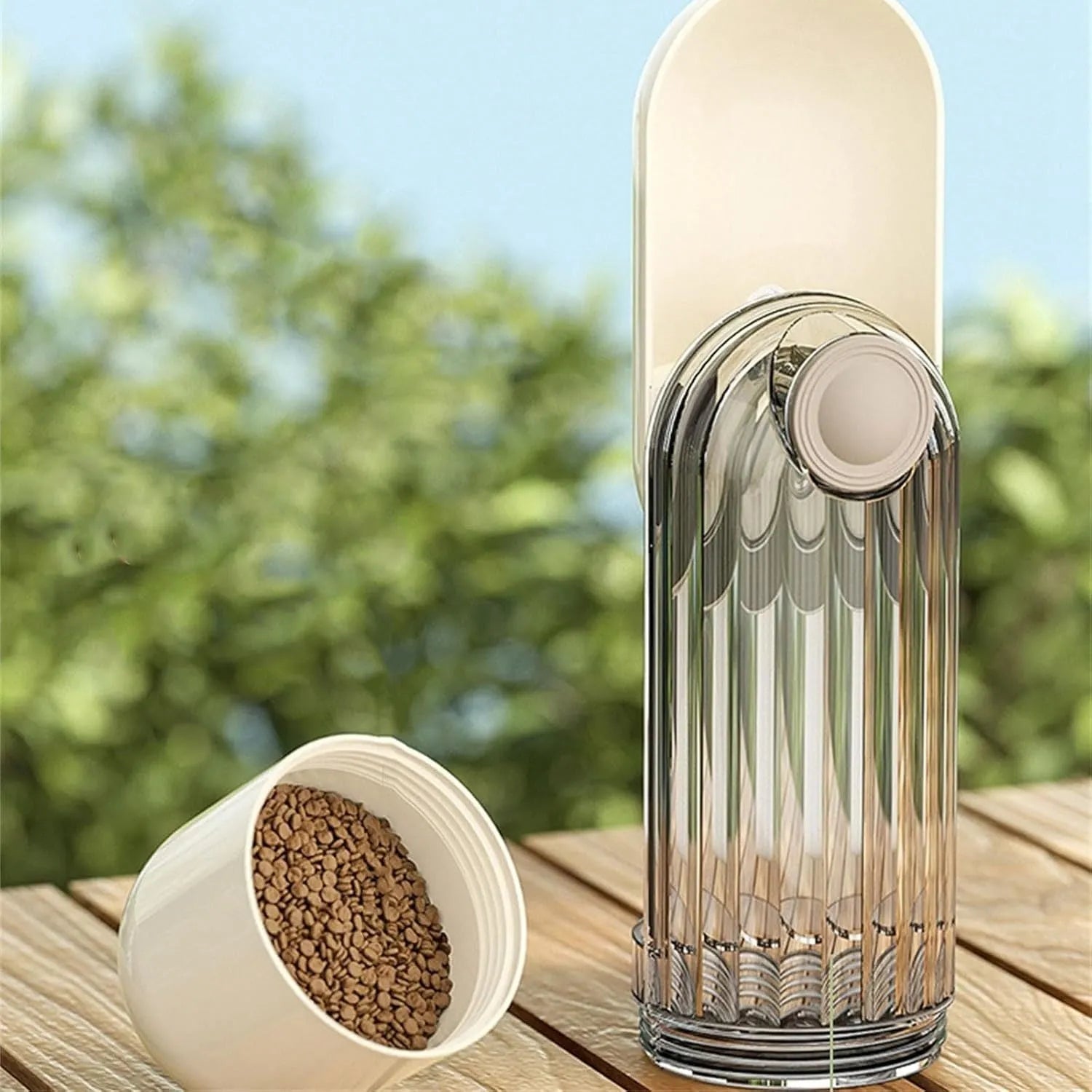 Beige foldable dog water bottle with drinking tray and base food container, shown open and closed