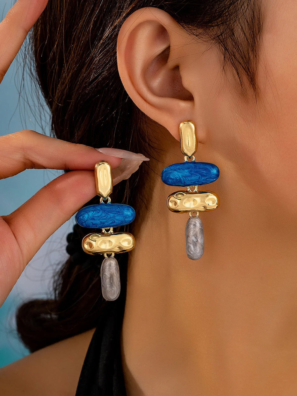Geometric stud earrings with multicolour electroplated finish on zinc alloy