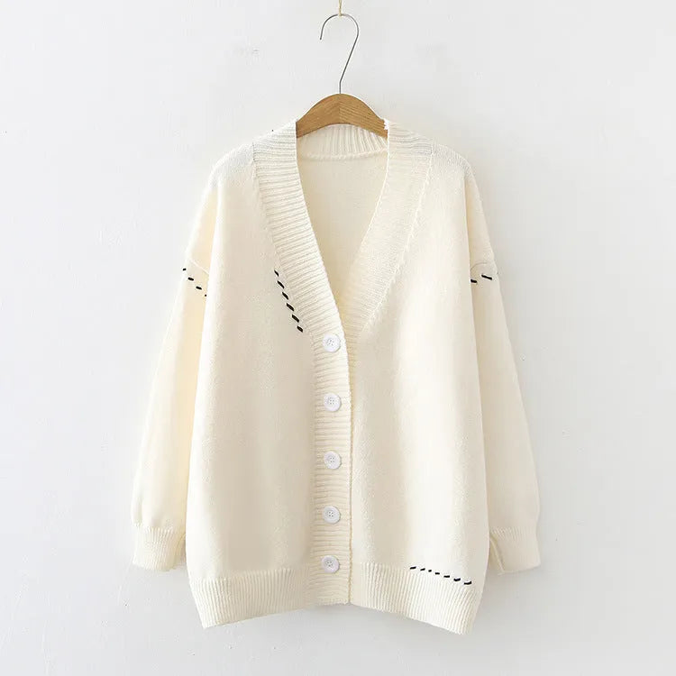 Women's loose fit knitted cardigan coat in black polyester fabric with long sleeves