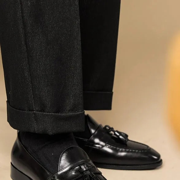 Men's polished leather tassel loafers in black and coffee colours with traditional British styling