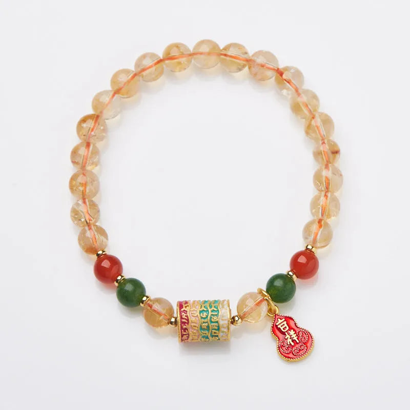 Hand-woven citrine crystal bracelet with five-sutra geometric design in fresh styling