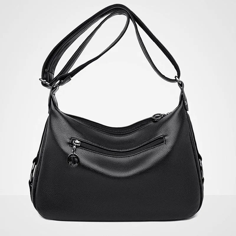 Large black women's shoulder bag with multiple internal organisation pockets and crossbody strap