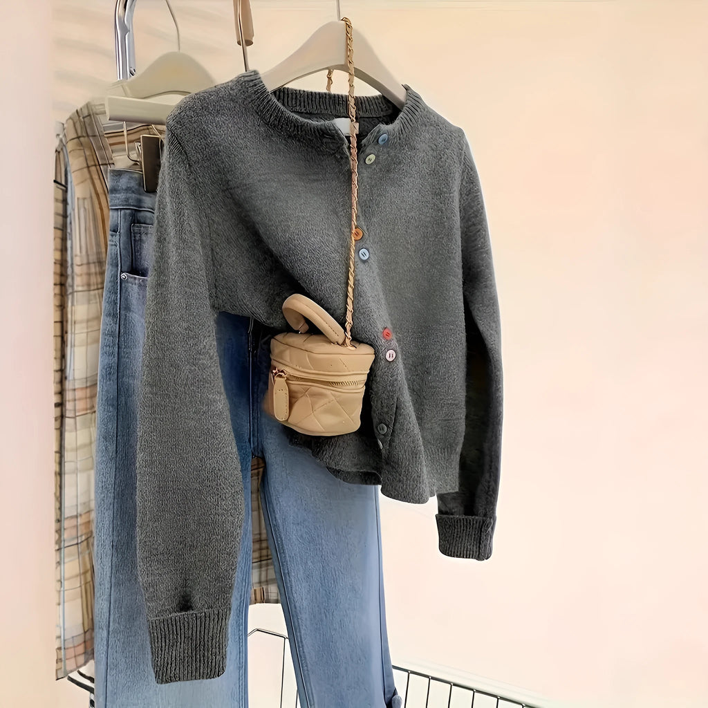 Dark grey women's cardigan sweater with button front and long sleeves.