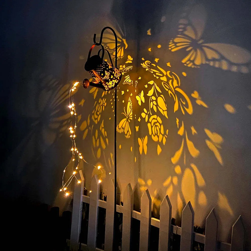 Tapered butterfly pattern iron solar garden lamp with warm white LED lighting