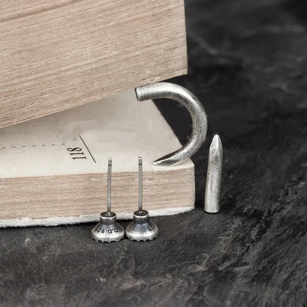 S925 sterling silver nail-shaped stud earrings in straight and curved punk designs