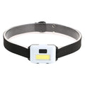 Compact blue outdoor LED headlamp with an adjustable black polyester strap, showing the COB bulb and control button.