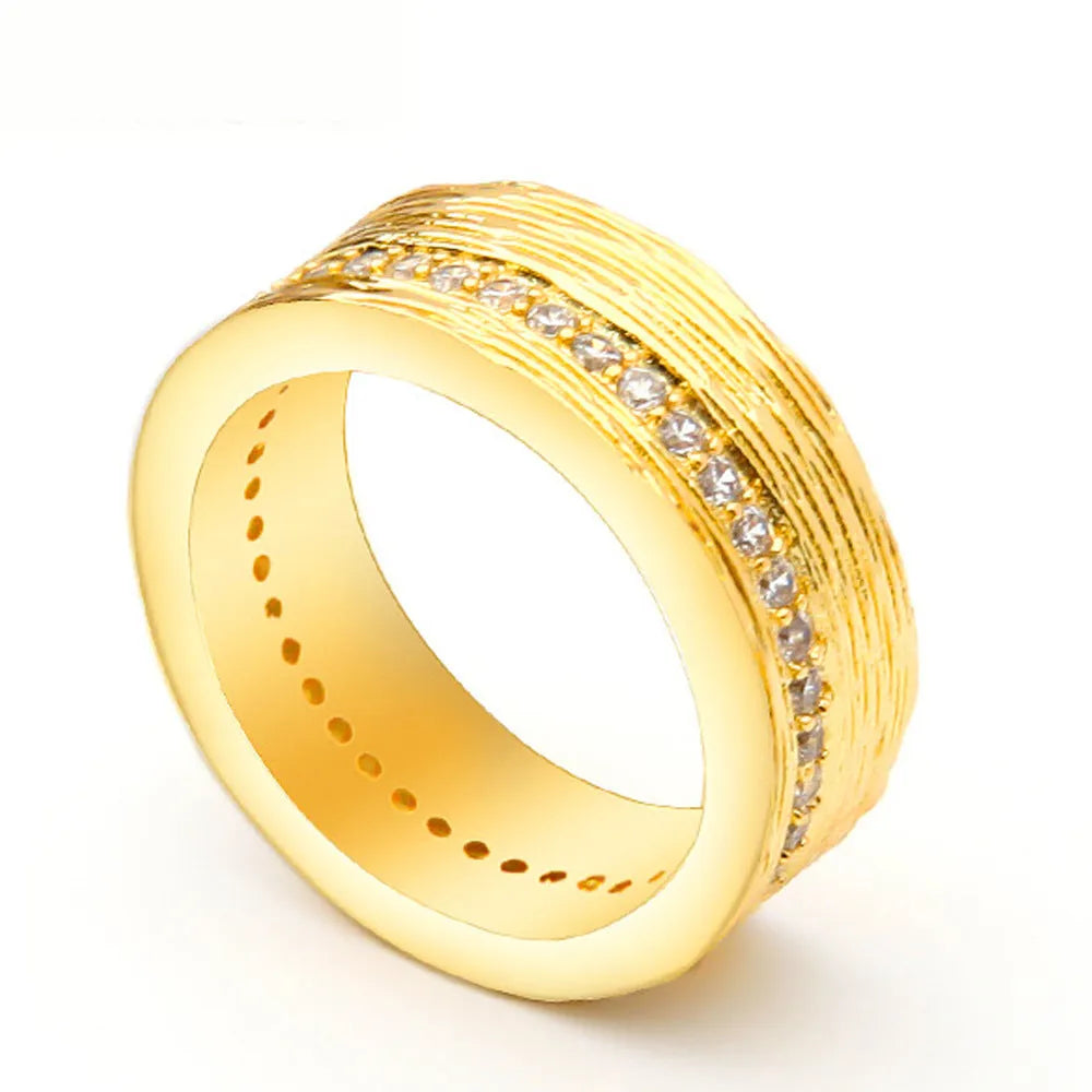 Gold-coloured geometric women's ring with zircon stone, shown from multiple angles