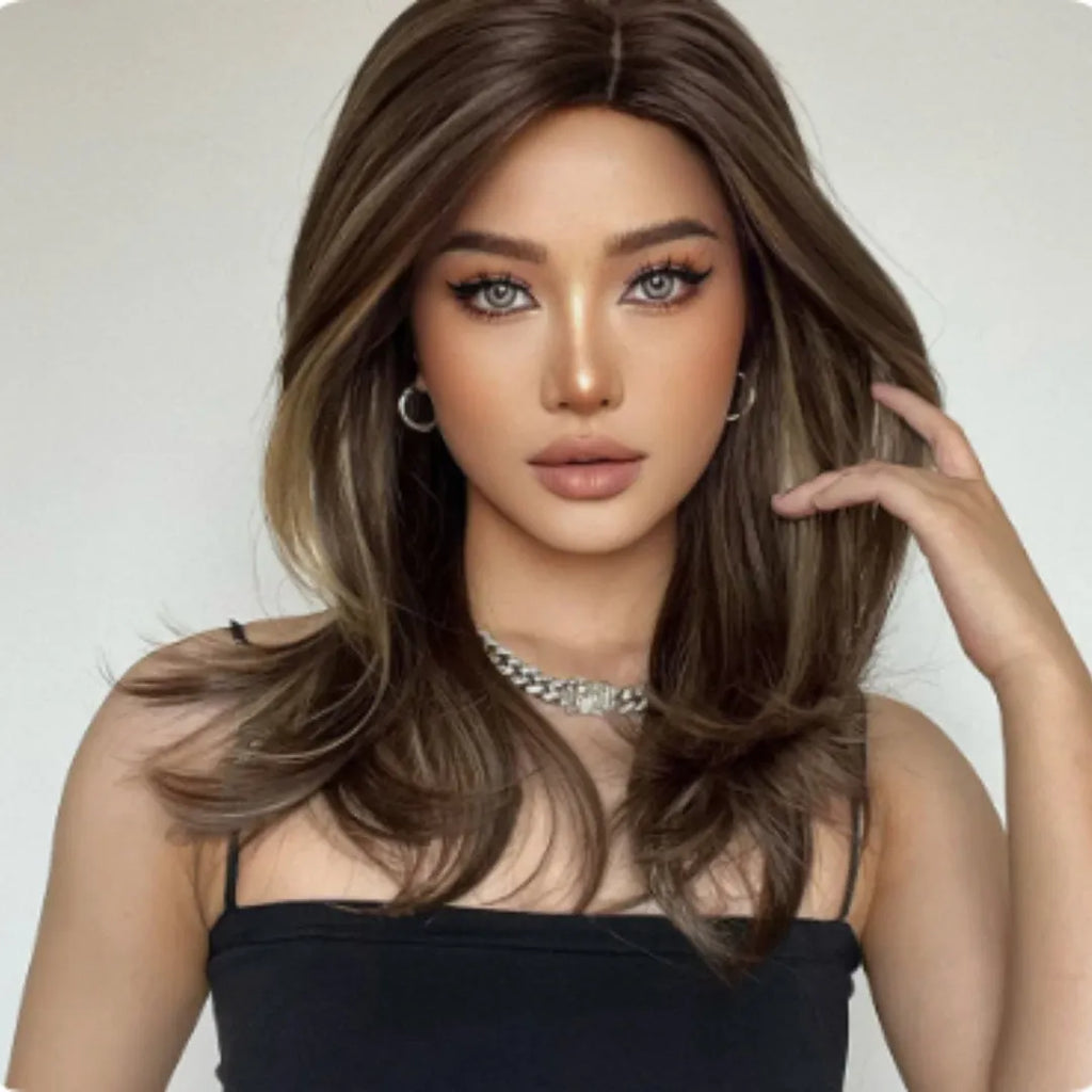 Mid-length curly synthetic wig with long fringe in a platinum gradient colour, available in brown, white gold and wine red.