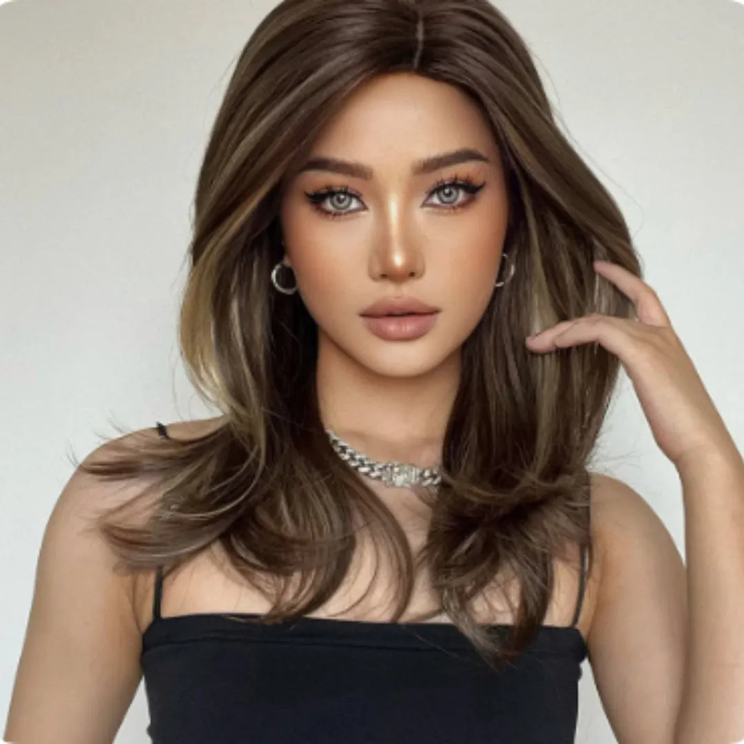 Mid-length curly synthetic wig with long fringe in a platinum gradient colour, available in brown, white gold and wine red.