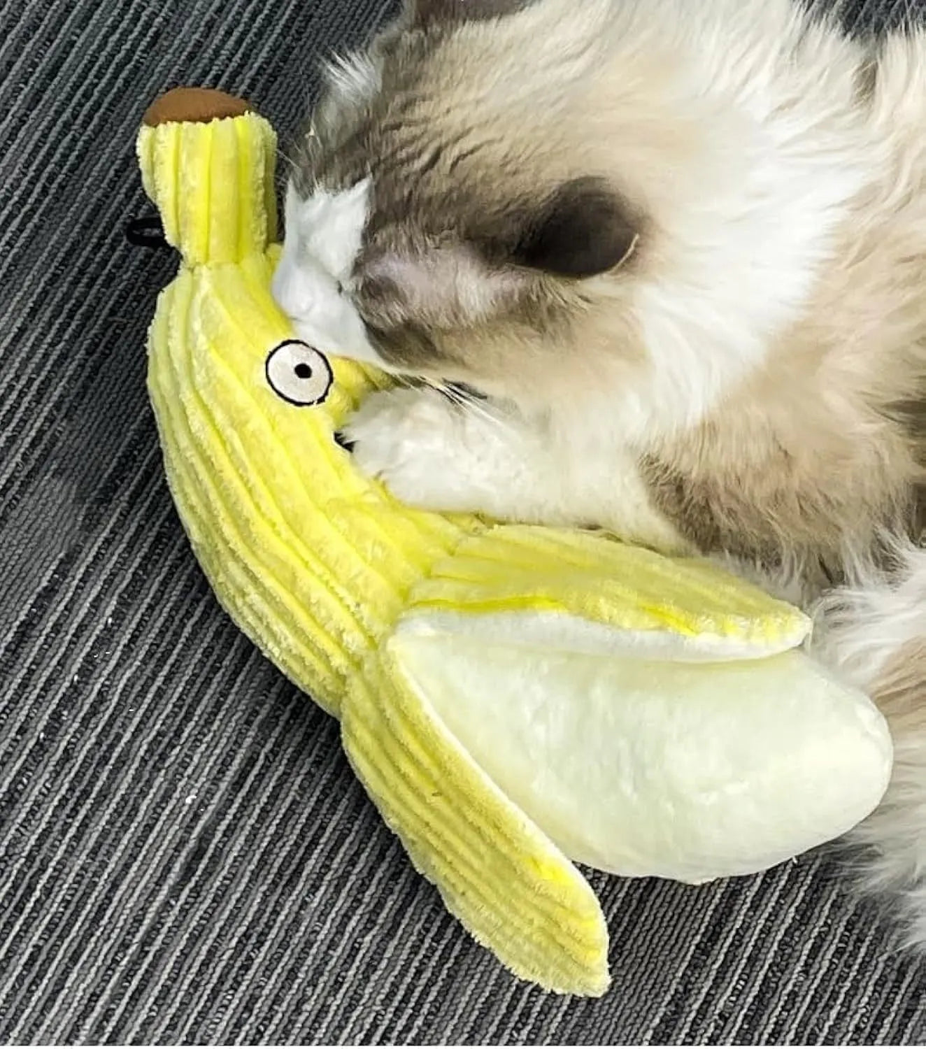 Yellow banana-shaped cat toy with crinkle paper and catnip for indoor feline play