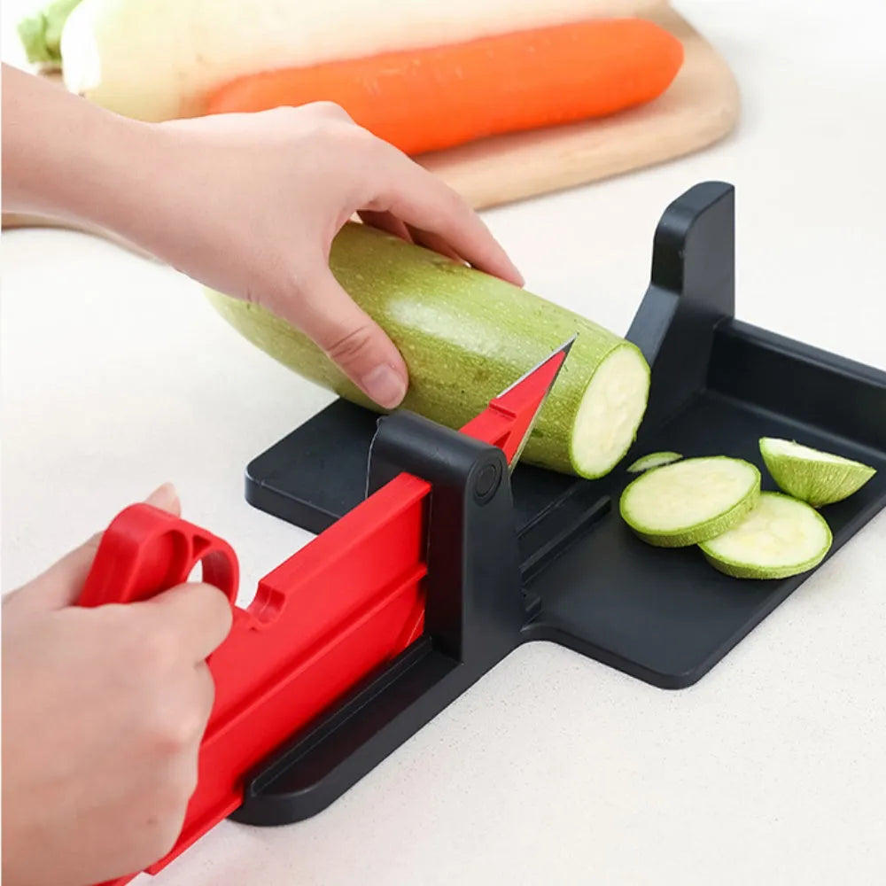 Green and red modern vegetable cutter with stainless steel blades for slicing carrots and potatoes