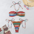 Halter neck women's split bikini swimsuit with high waist briefs in blue colour.