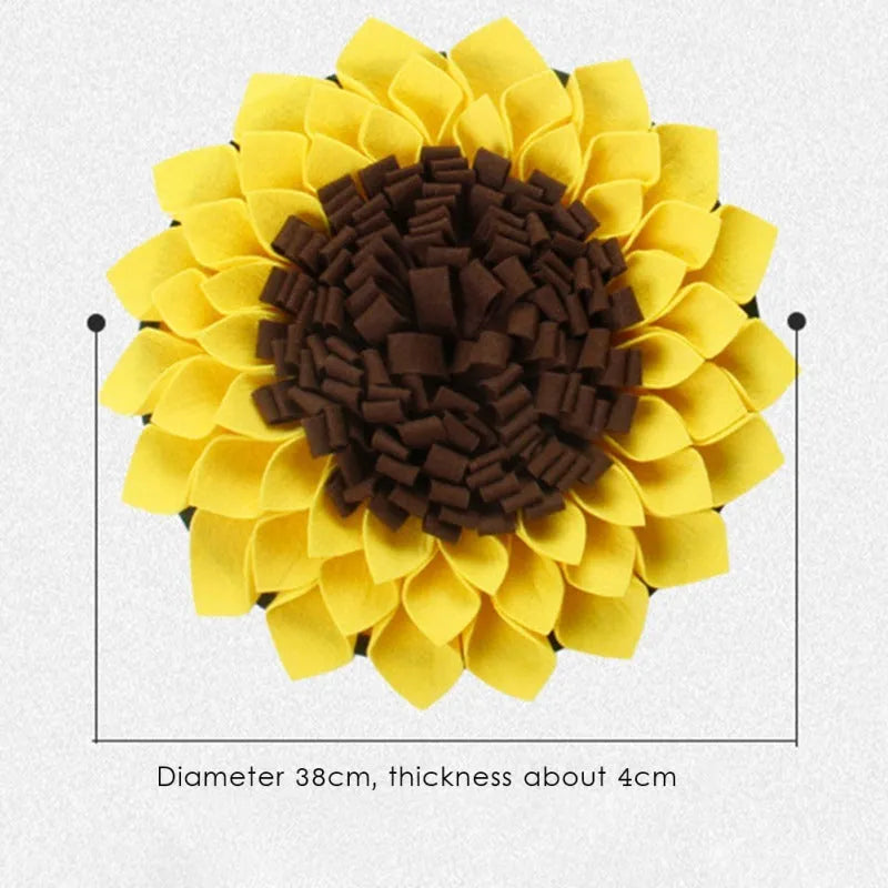 Yellow sunflower-shaped dog snuffle mat with fleece texture and a buckle strap for non-slip use.