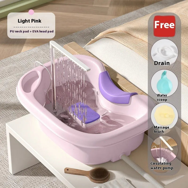 Home shampoo basin with neck pillow and water pump for use while lying down in bed