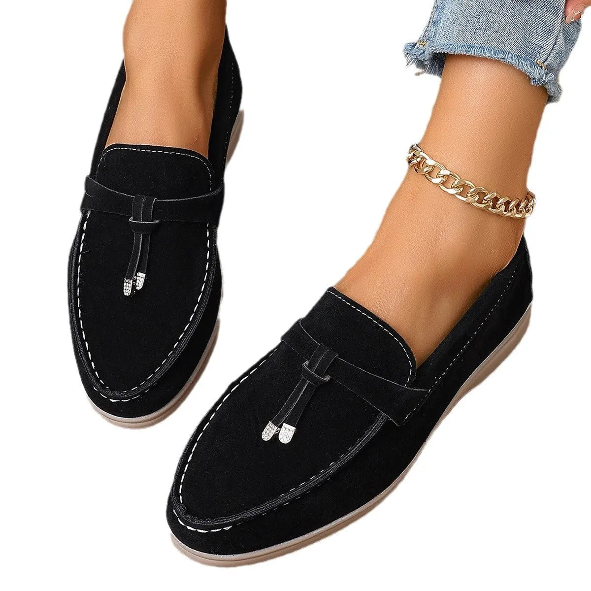 Men's canvas slip-on loafers with rubber sole in black colour showing round toe and platform heel design