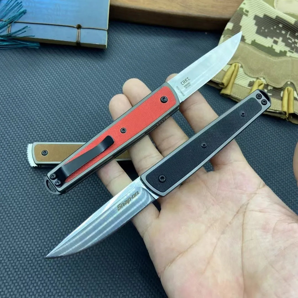 Folding fruit knife with stainless steel blade shown unfolded displaying 7cm blade length and 10cm handle