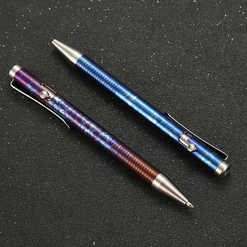 Titanium alloy bolt handle ballpoint pen with magic colour finish showing random phantom colour distribution