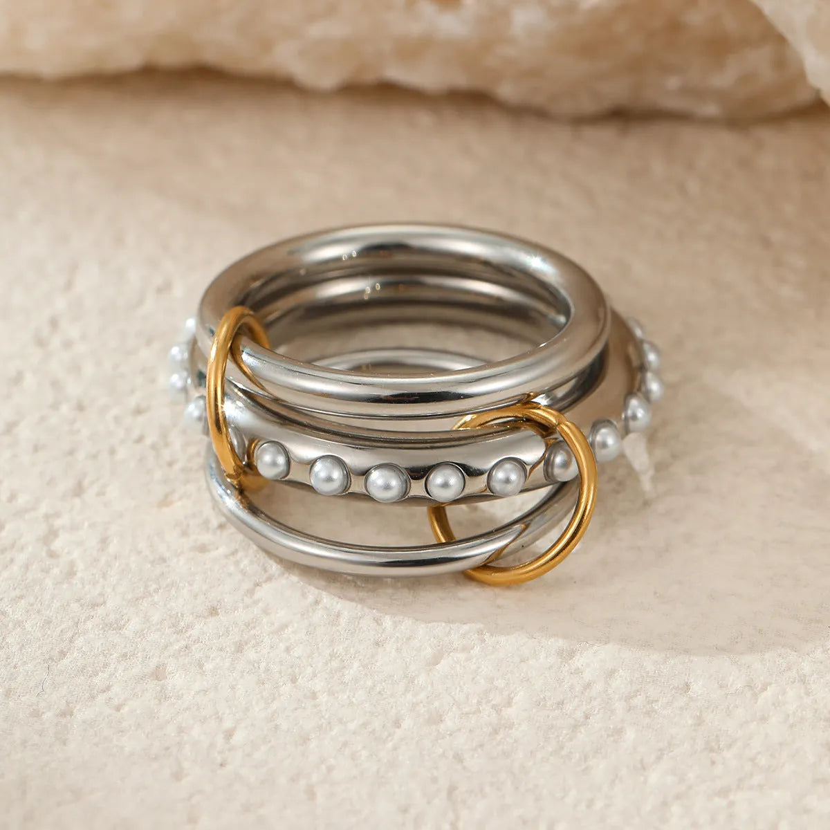 Stackable stainless steel rings with gold plating in three colour variations