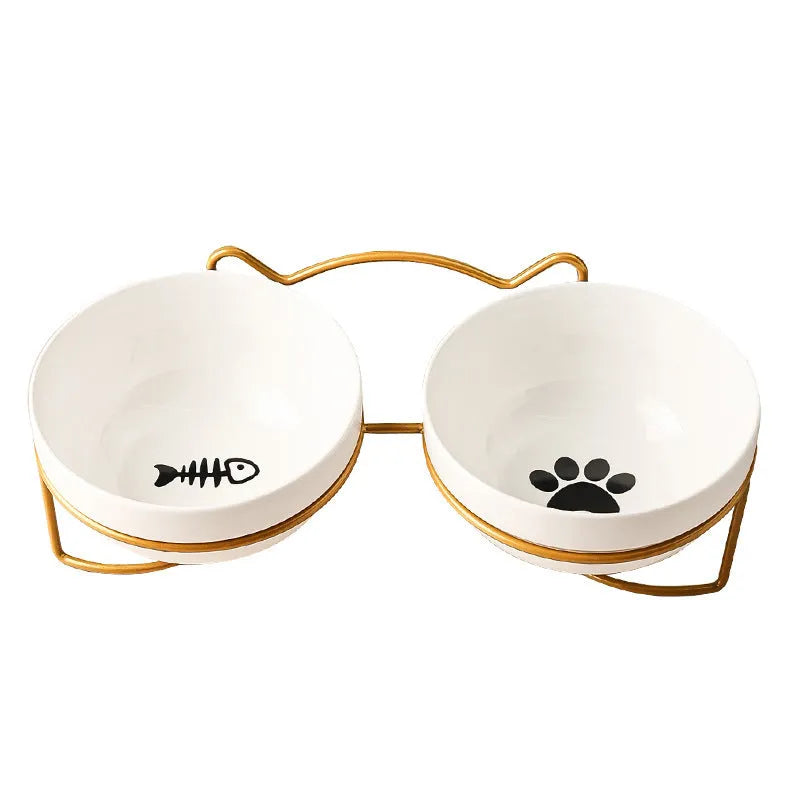 White ceramic cat bowl with cat paw design in black iron frame
