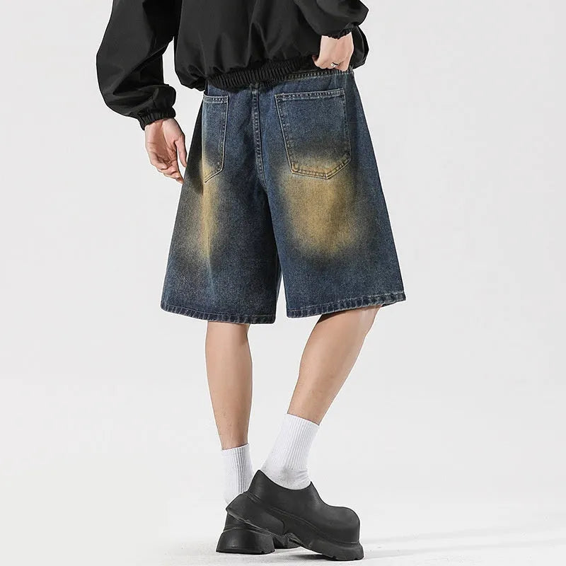 Retro blue loose fit ripped jeans with distressed detailing and cotton denim construction