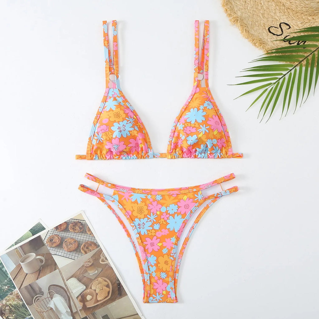 Women's halter swim briefs in floral print with backless styling