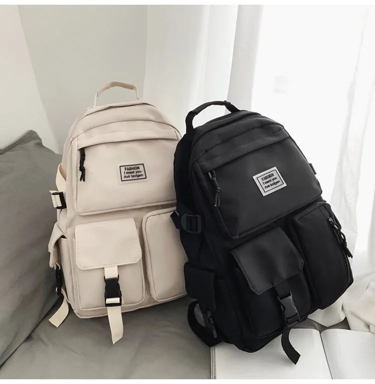 Soft black and white student backpack with laptop compartment and 3D pocket