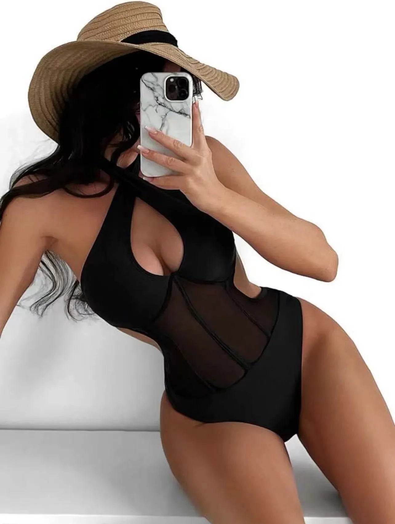 Ladies black one-piece spun yarn swimsuit bikini on a hanger.