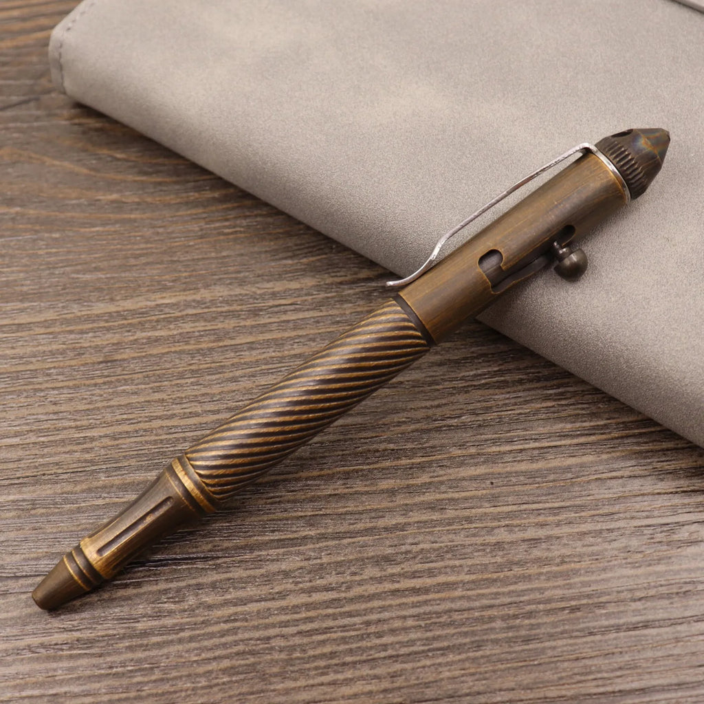Solid brass bolt-action tactical pen showing its retro design and metallic finish.