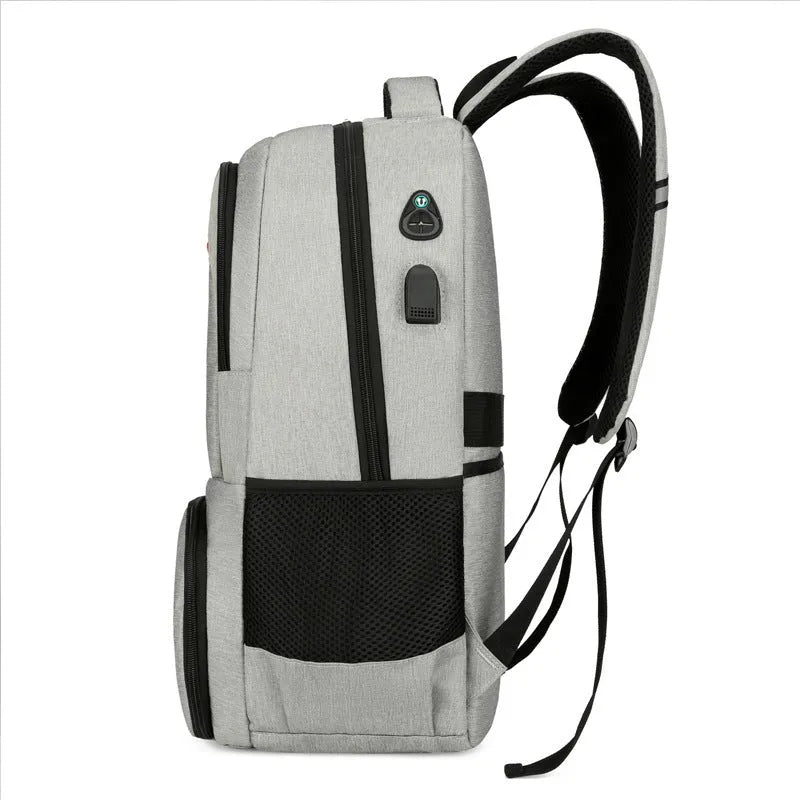 Light grey insulated Oxford cloth backpack with curved shoulder straps and dry-wet separation compartments