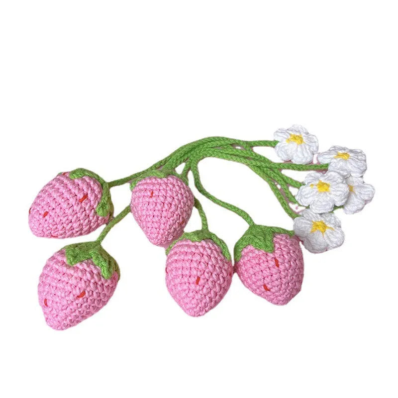 Red wool crochet strawberry pendant with a 35 cm knitted cord against a white background.