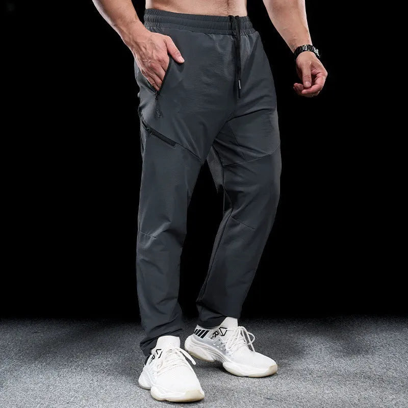Men's Army Green waterproof quick-drying nylon workout pants, trousers length with mid waist.