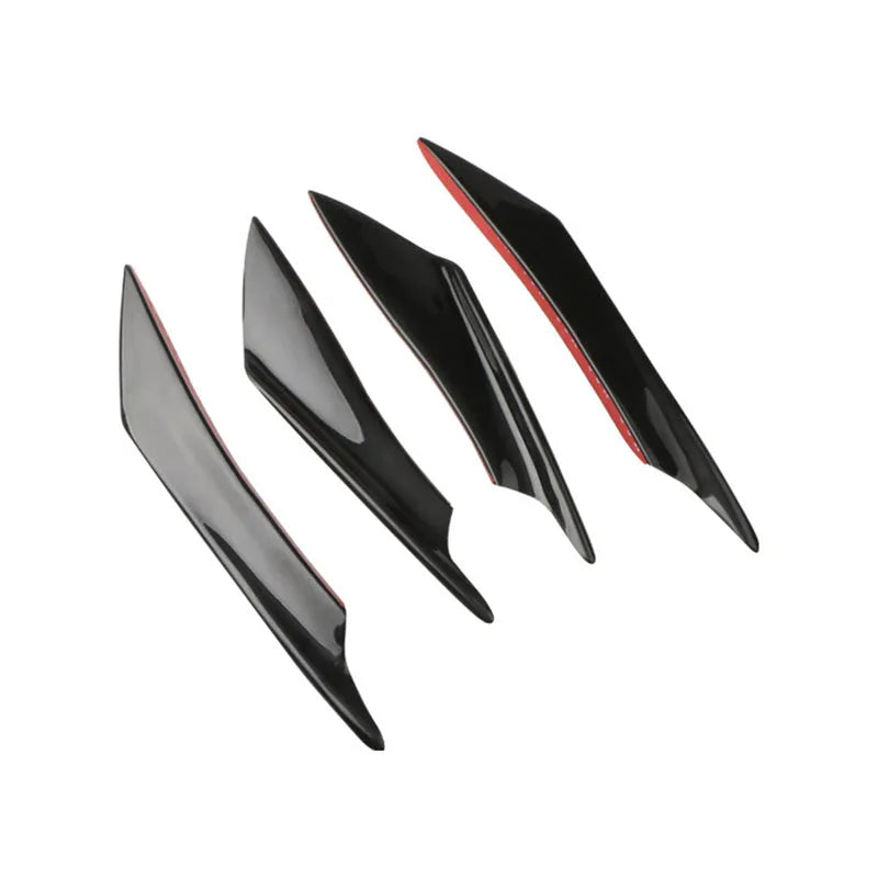 Set of four carbon fibre pattern automotive bumper blades mounted on vehicle