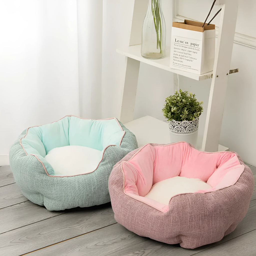 Blue octagonal pet bed for small dog with high sides and removable interior mat.