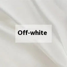 Double-sided solid colour silk duvet cover shown in Lotus Pink on a bed