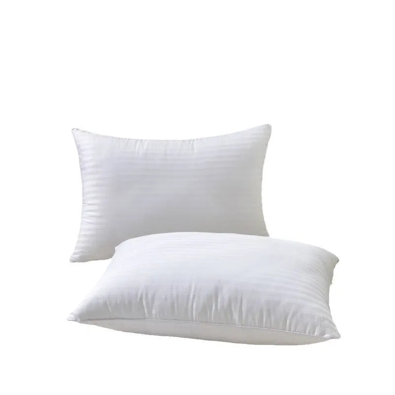 White cotton satin stripe feather and cotton pillow showing three size options