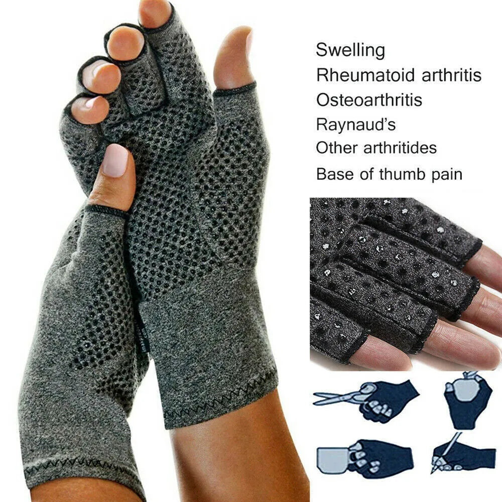 Grey half-finger joint compression gloves with anti-slip grip on a flat surface.