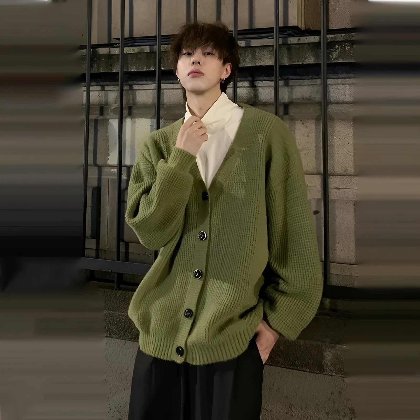 Men's army green loose fit v-neck cotton blend cardigan on a hanger